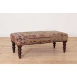 A kilim upholstered stool,