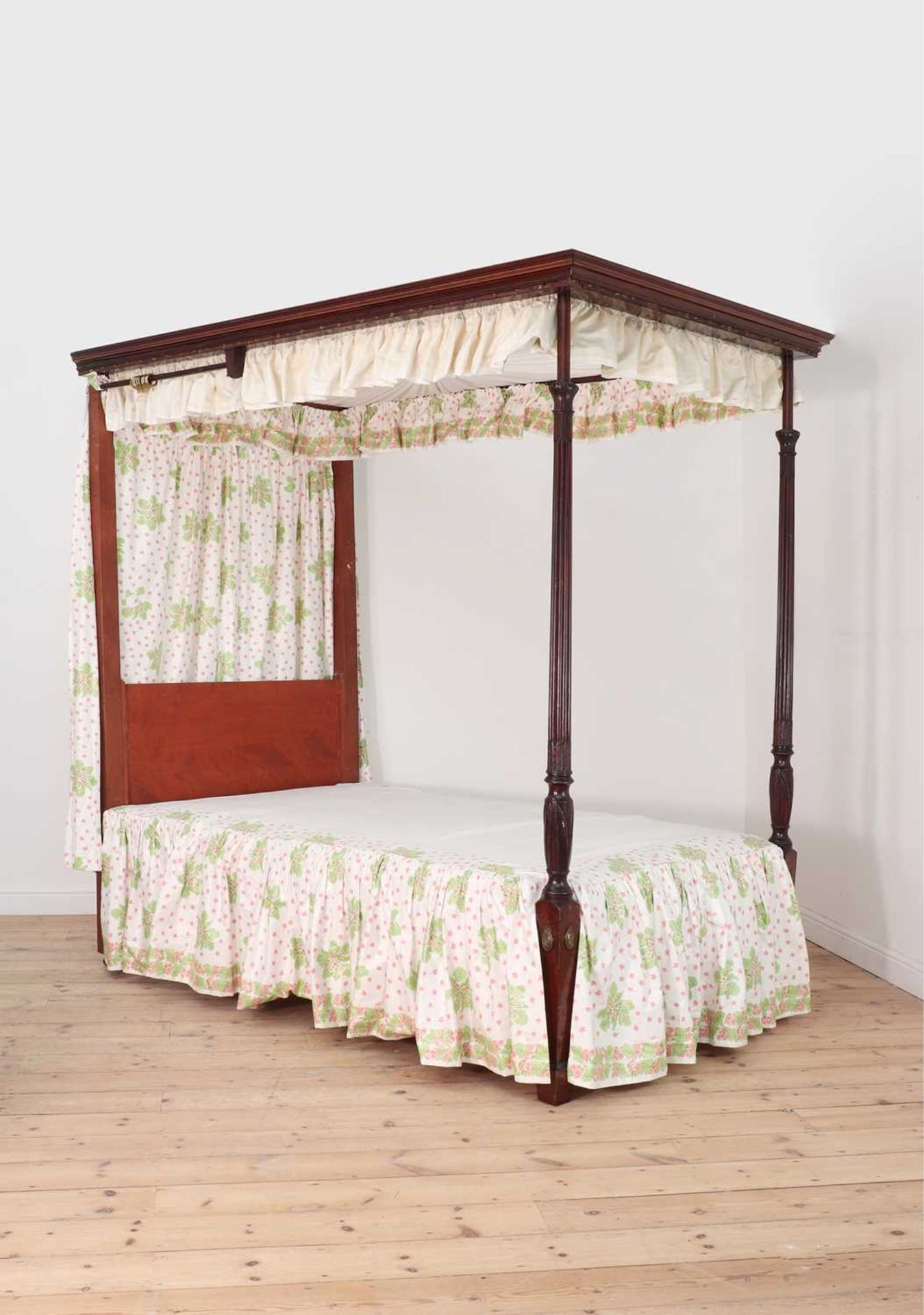 A George III-style mahogany tester bed,