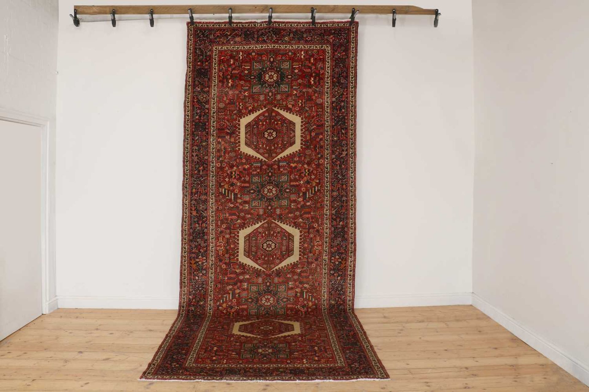 A Persian Heriz wool carpet,