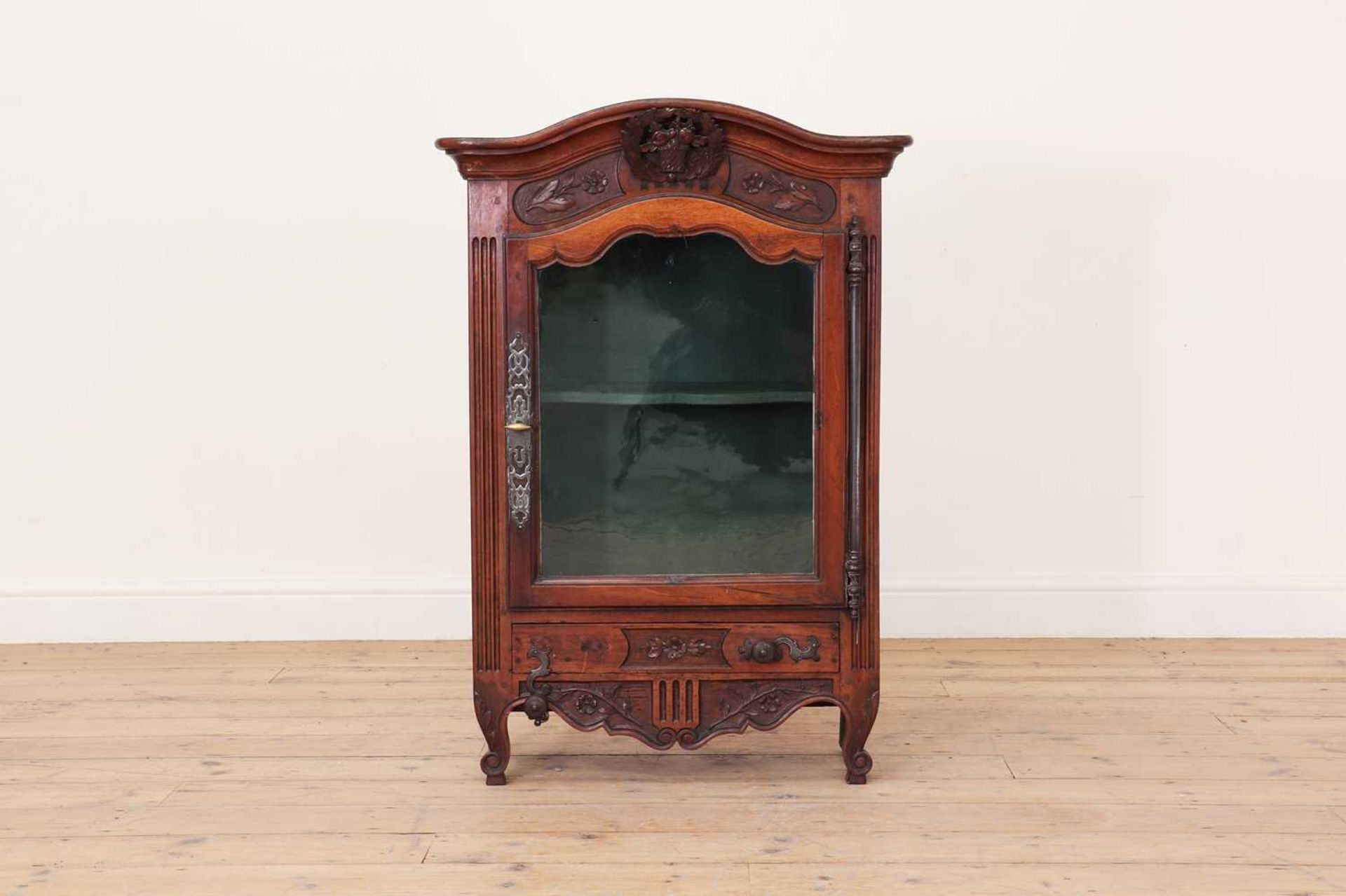 A French walnut display cabinet,