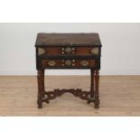 A hardwood, ebony and brass desk on stand,