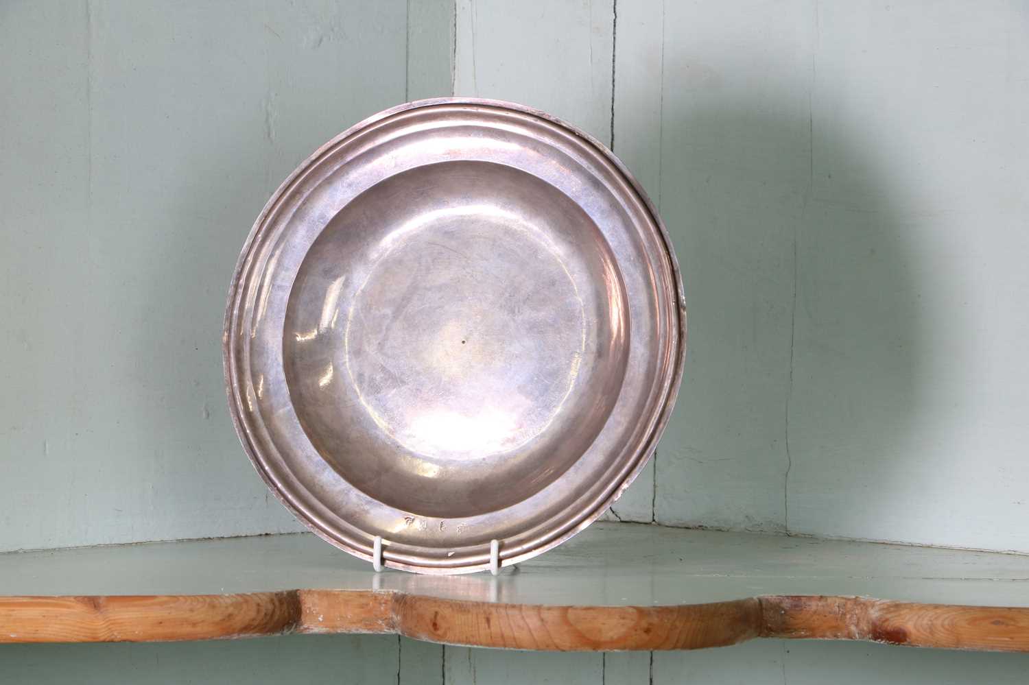 A Queen Anne Britannia standard alms dish,