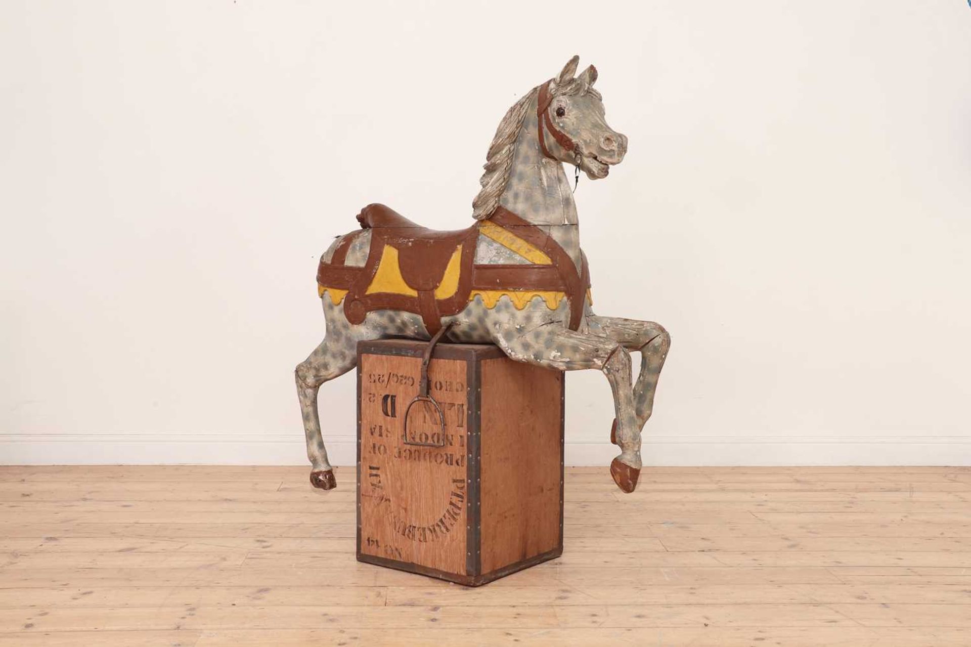 A painted carved wood carousel galloper,