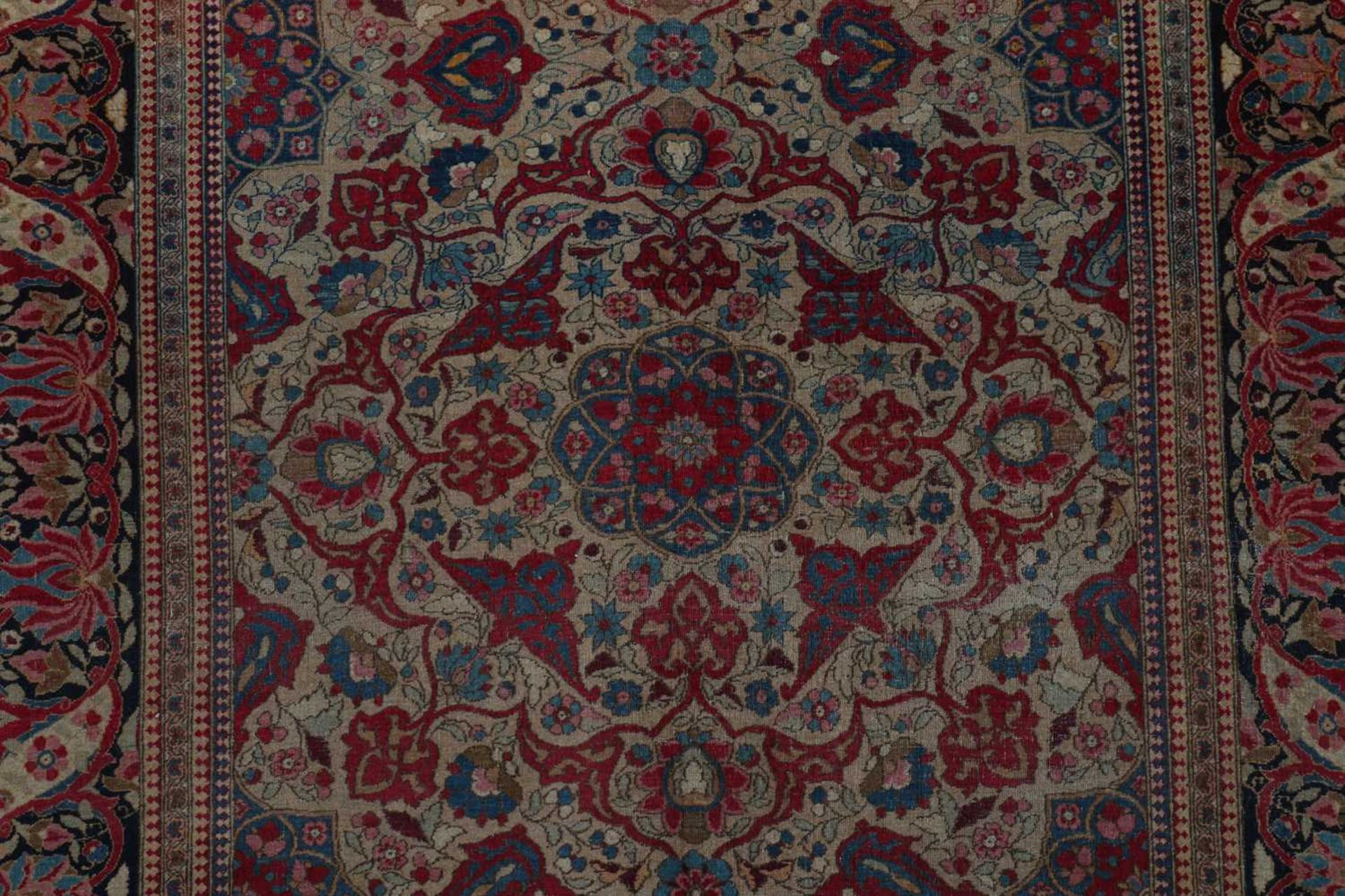 A Persian wool rug - Image 4 of 13