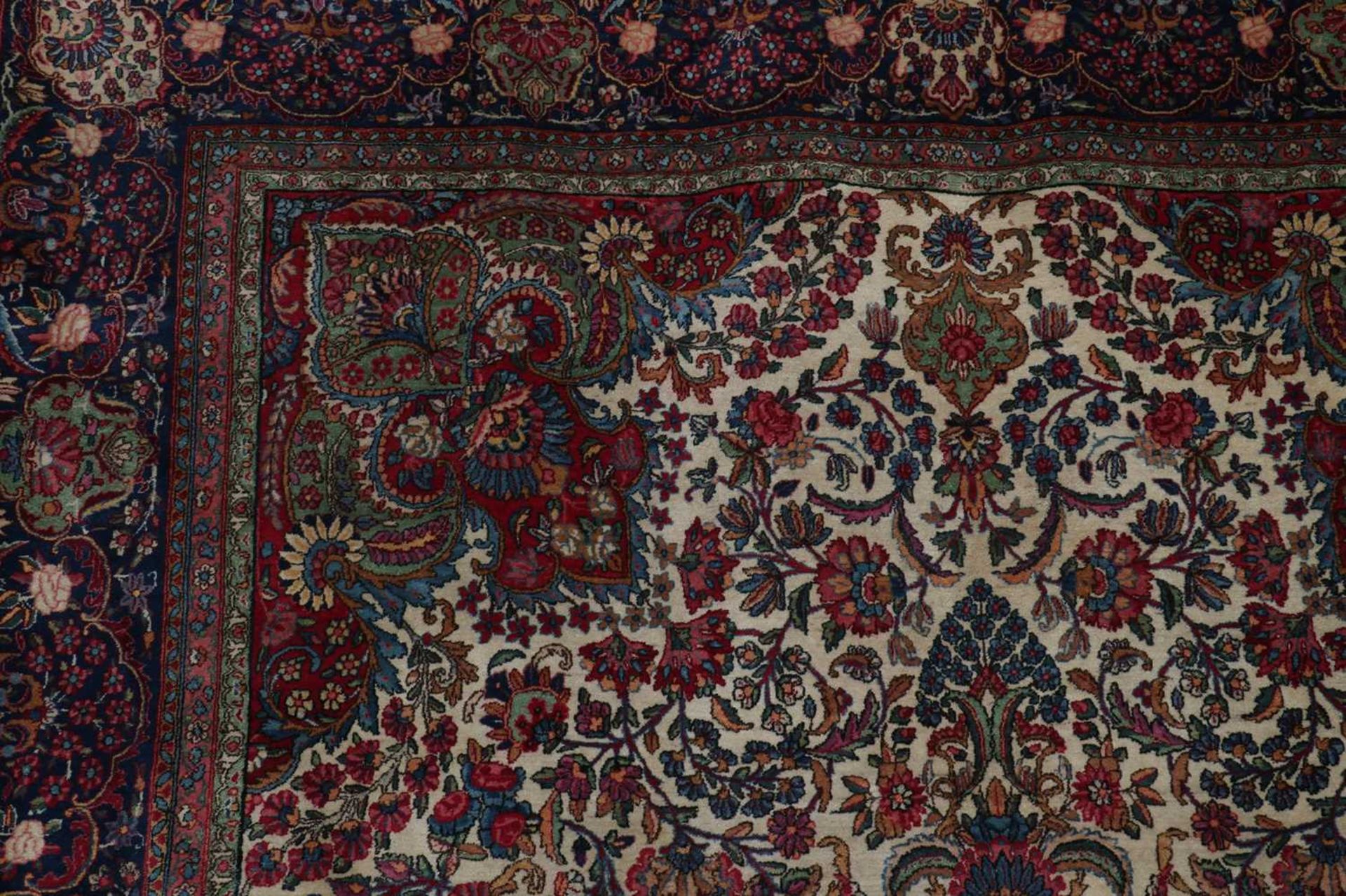 A Persian wool carpet, - Bild 2 aus 6