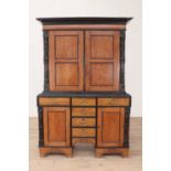 A satinwood and ebony cabinet,