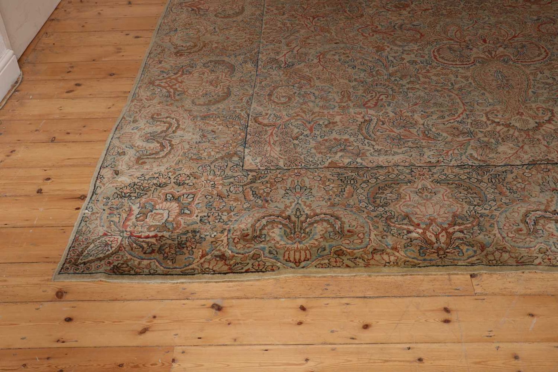 A large Persian wool carpet, - Bild 3 aus 7