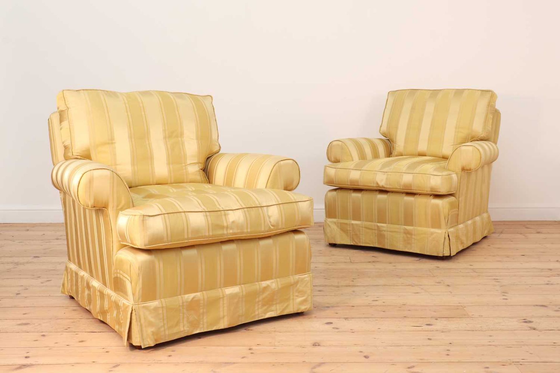 A pair of armchairs,