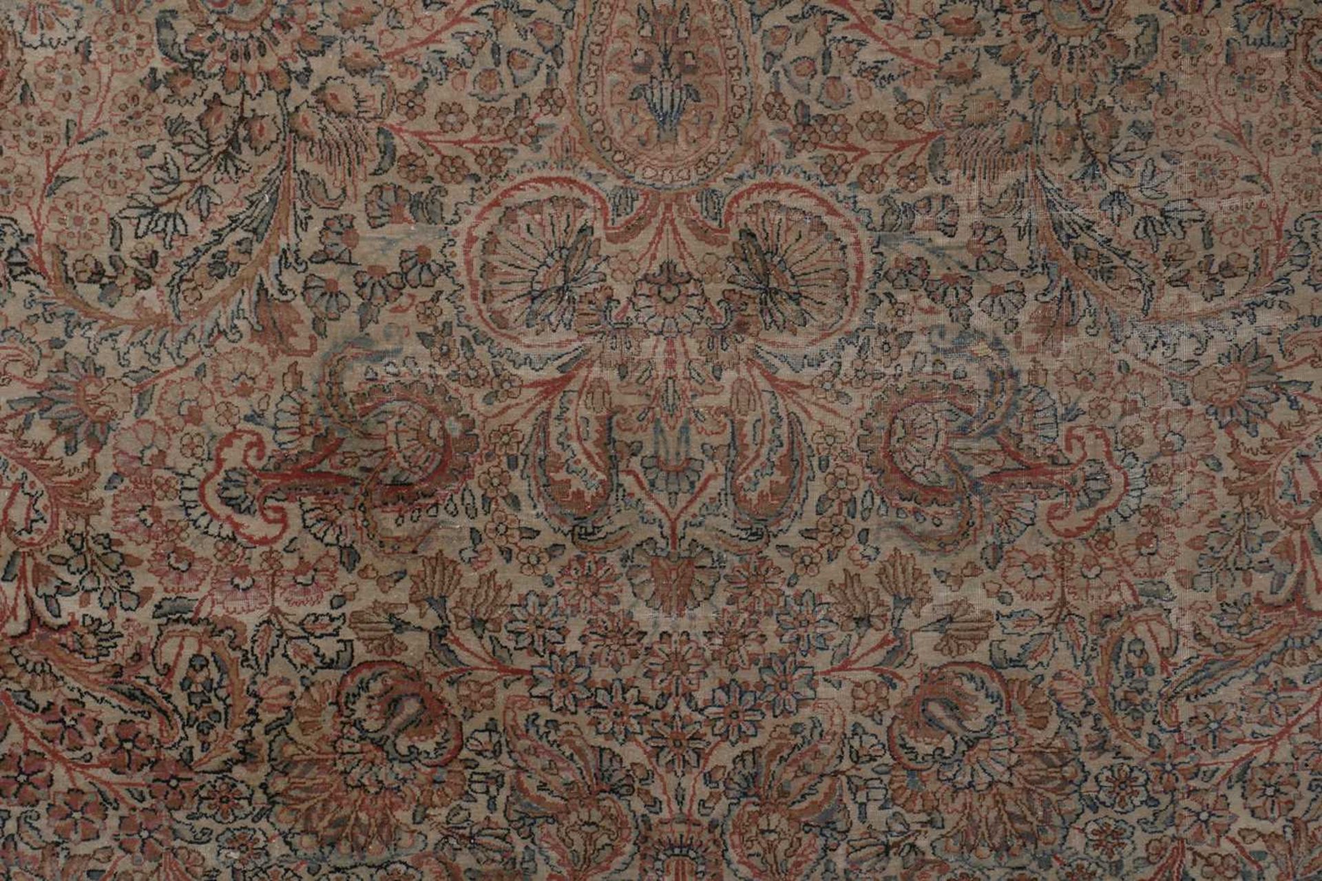 A large Persian wool carpet, - Bild 7 aus 7
