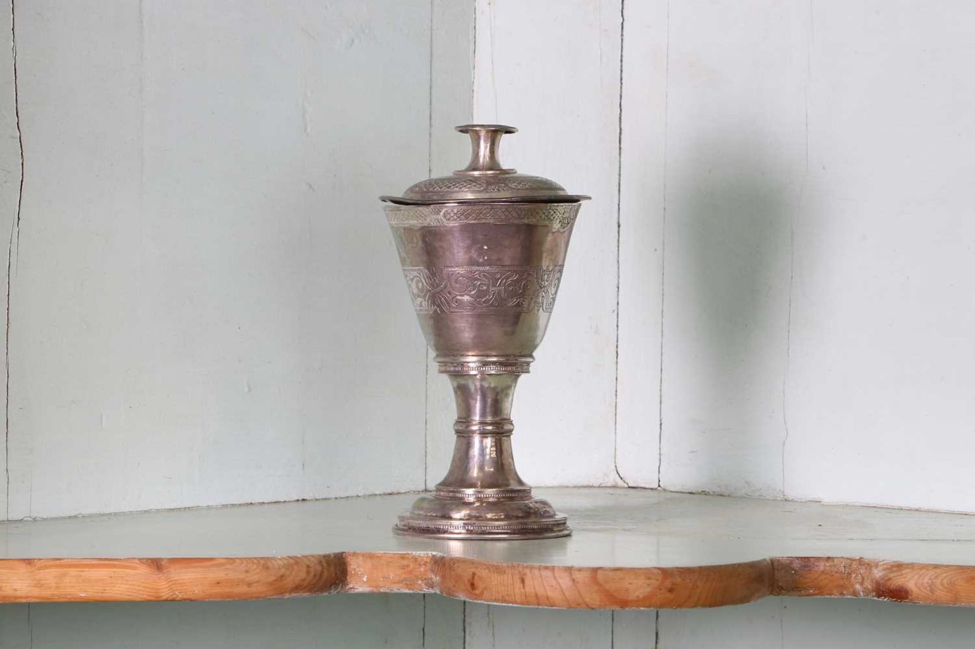 An unmarked silver communion cup and paten, - Image 2 of 3