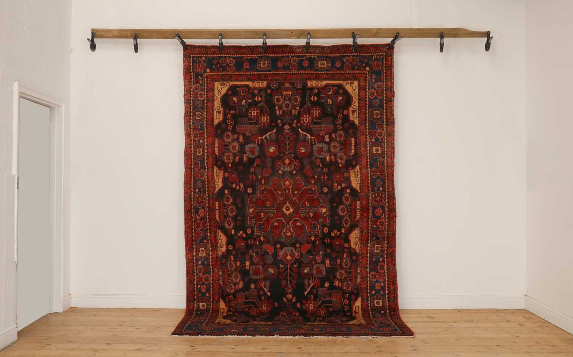 A Persian Heriz wool rug,