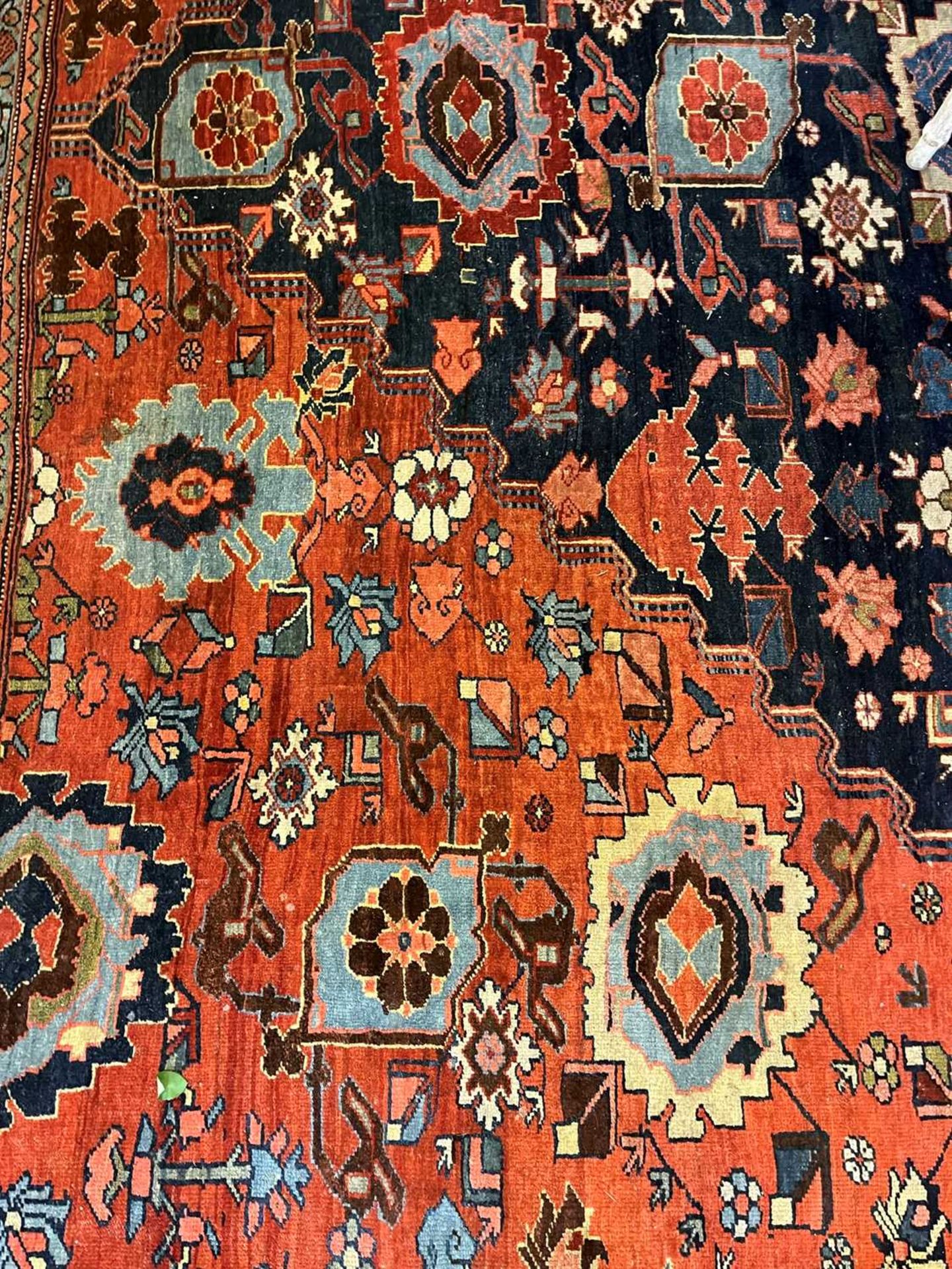 A large Persian wool carpet, - Image 8 of 28