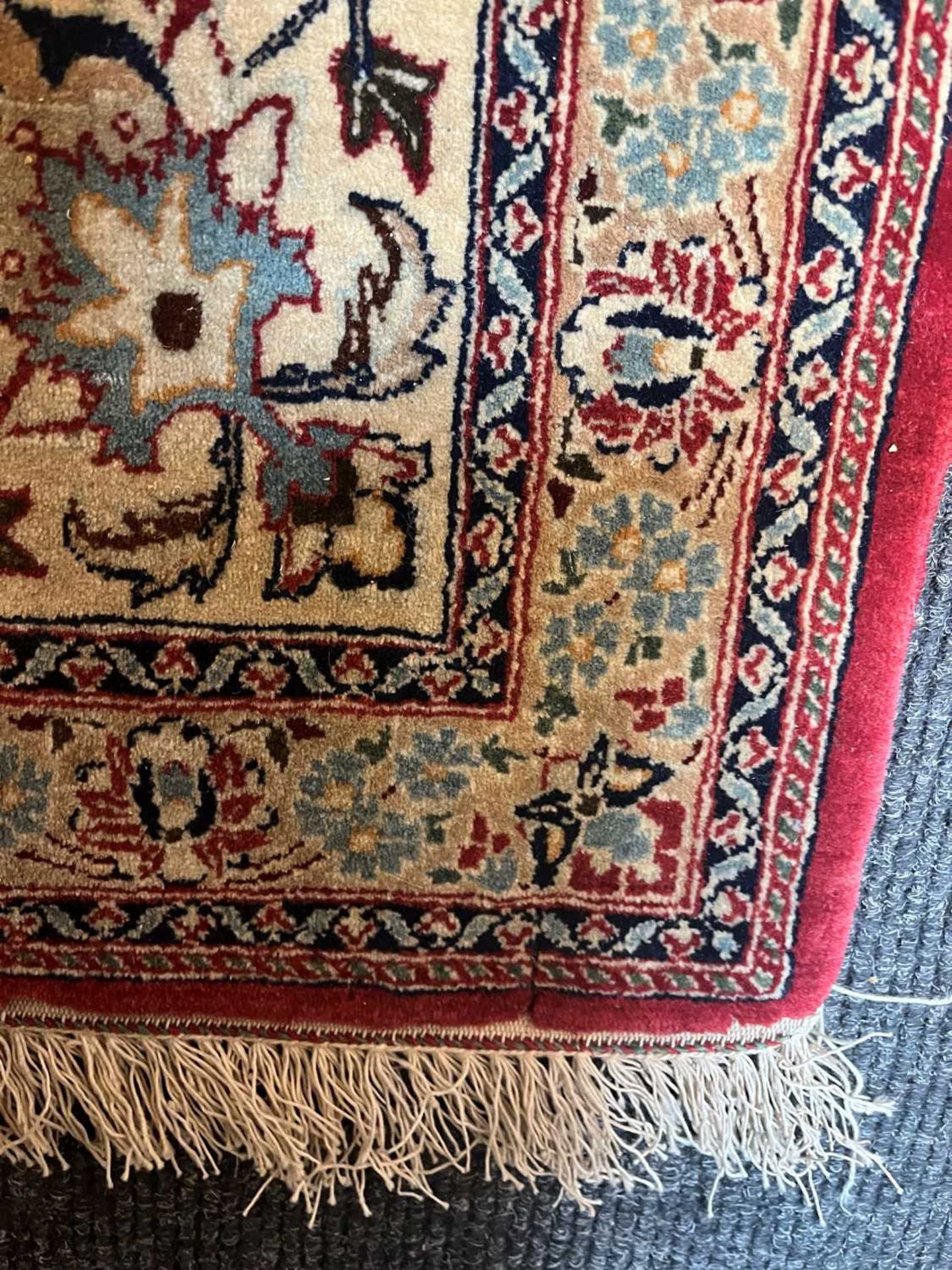 A Persian wool rug, - Bild 10 aus 16