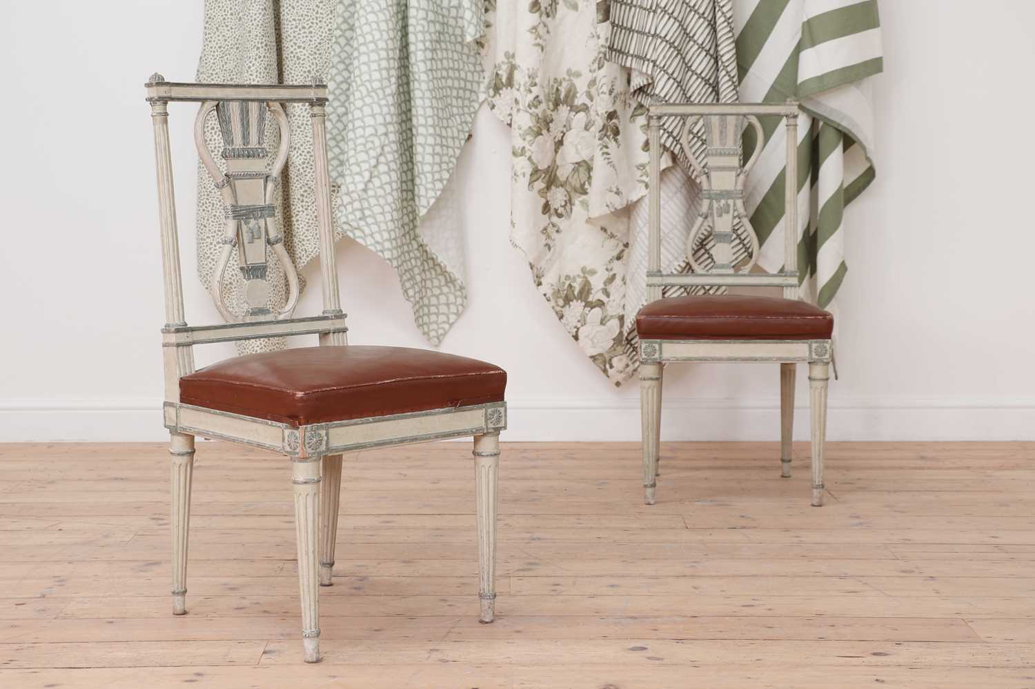 A set of six Louis XVI-style painted single chairs,