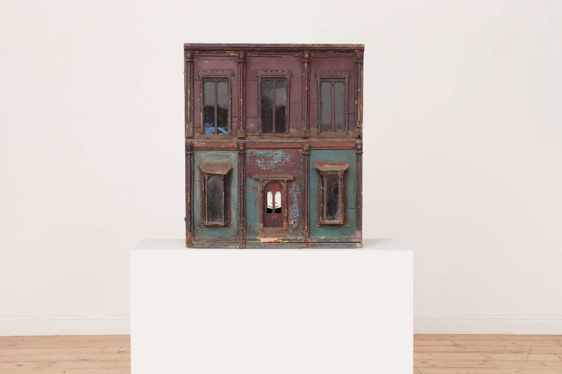 A painted double front doll's house,