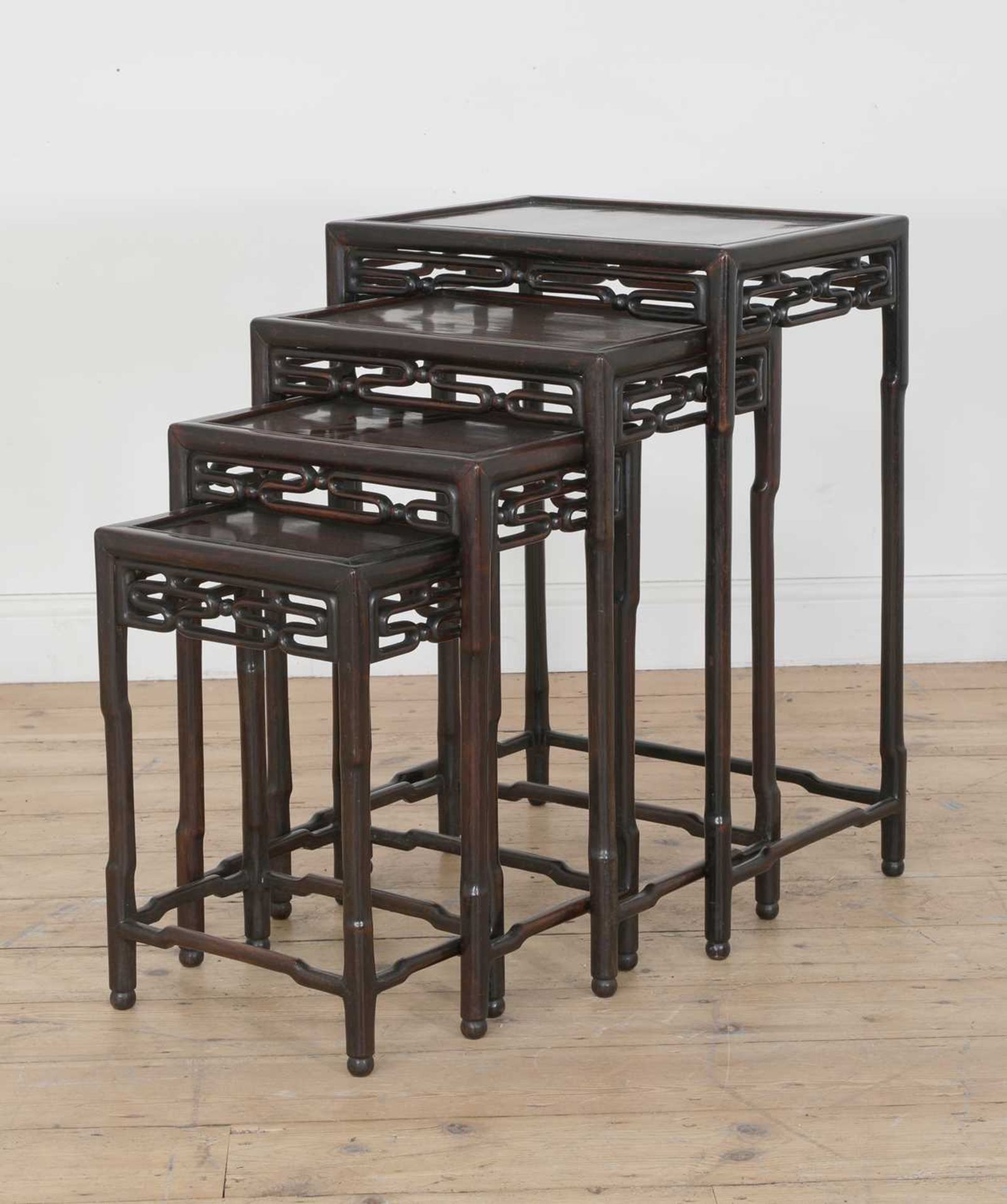 A nest of four Chinese hardwood tables,