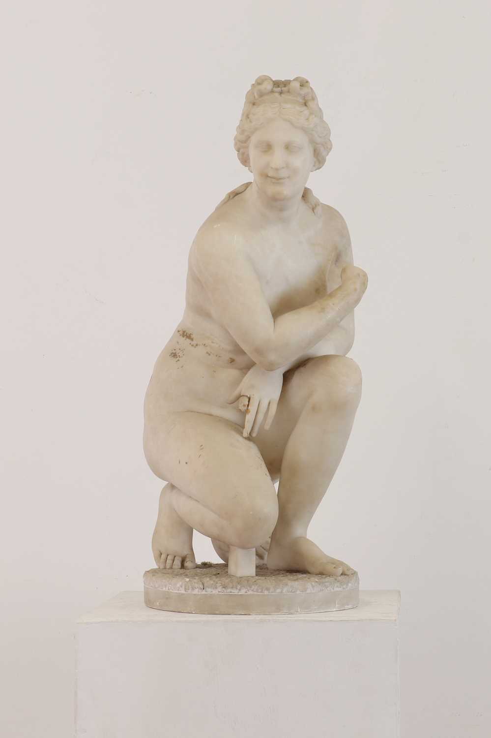 After the antique, a grand tour alabaster sculpture of the crouching Venus,