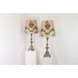 A pair of silver-plated brass altar candlestick lamps,