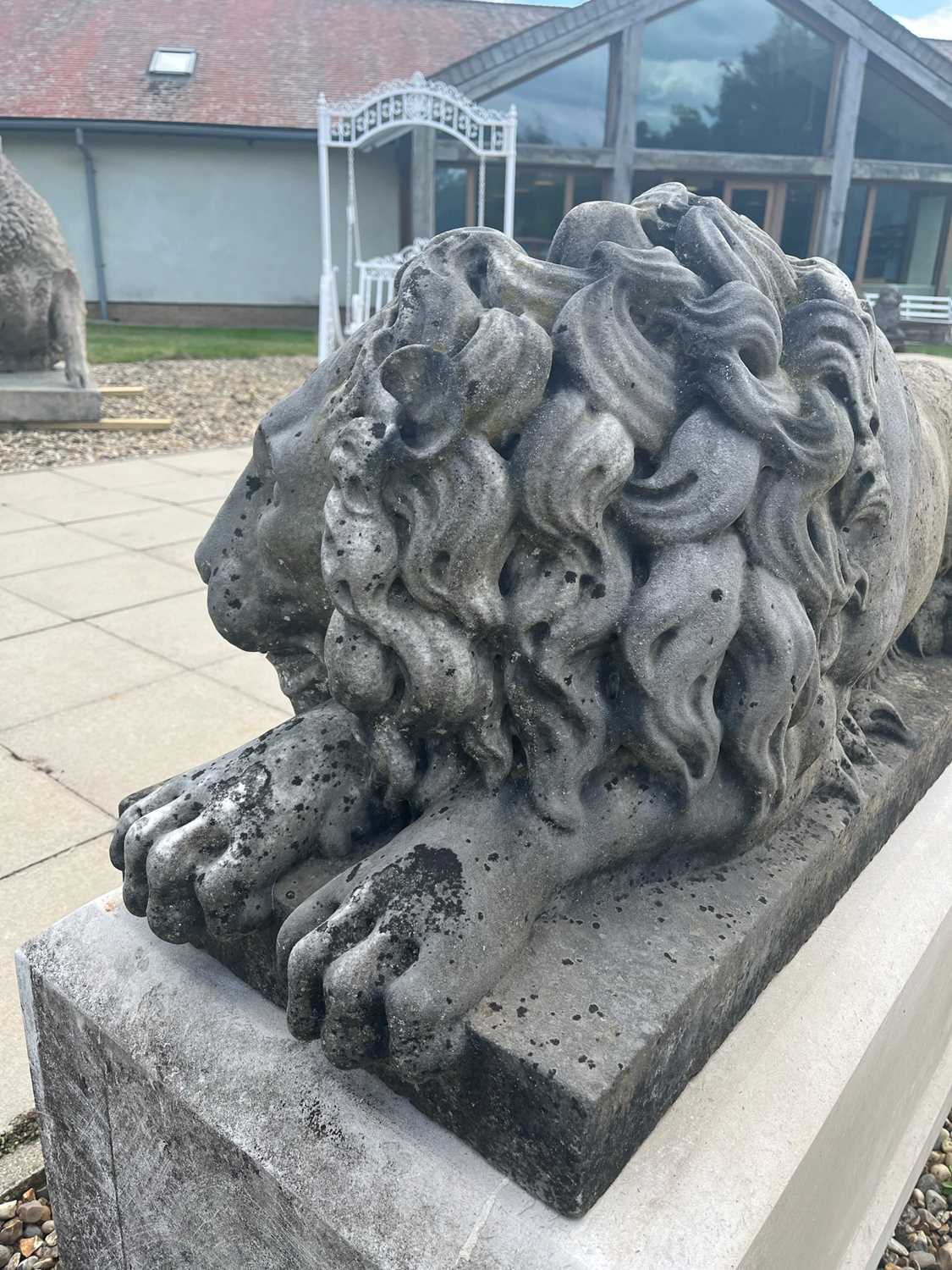 A pair of monumental marble lions on plinths, - Image 24 of 25