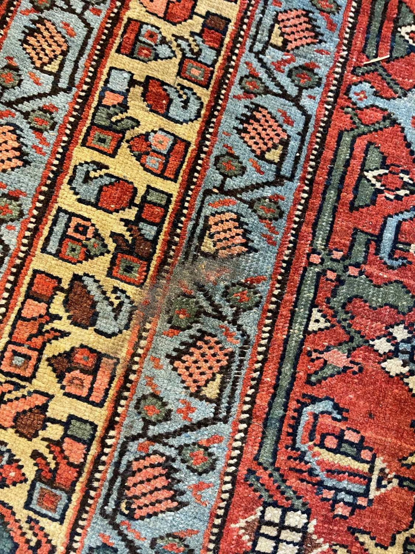 A large Persian wool carpet, - Image 16 of 28