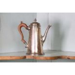 A George II silver coffee pot,