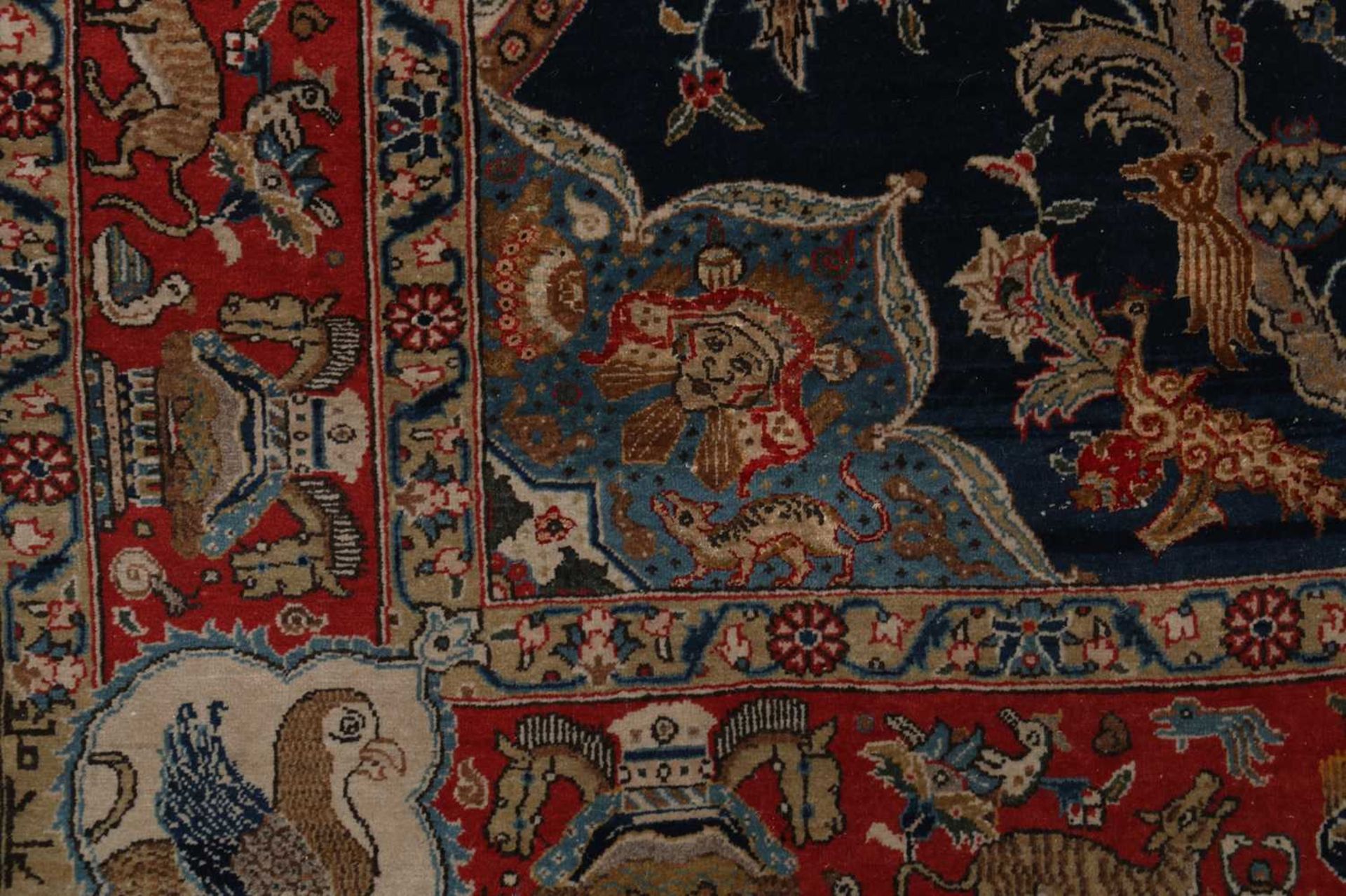 A Persian wool and silk rug, - Image 4 of 5