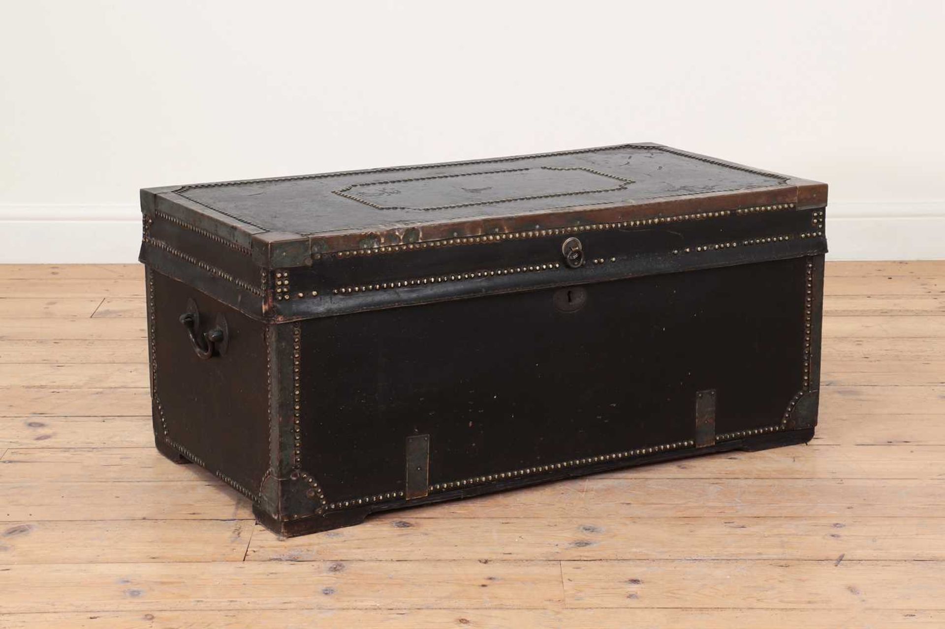 A studded, brass-mounted and leather-clad camphor chest,