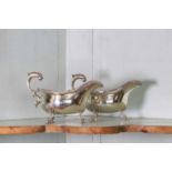 A pair of Edwardian silver sauce or gravy boats,