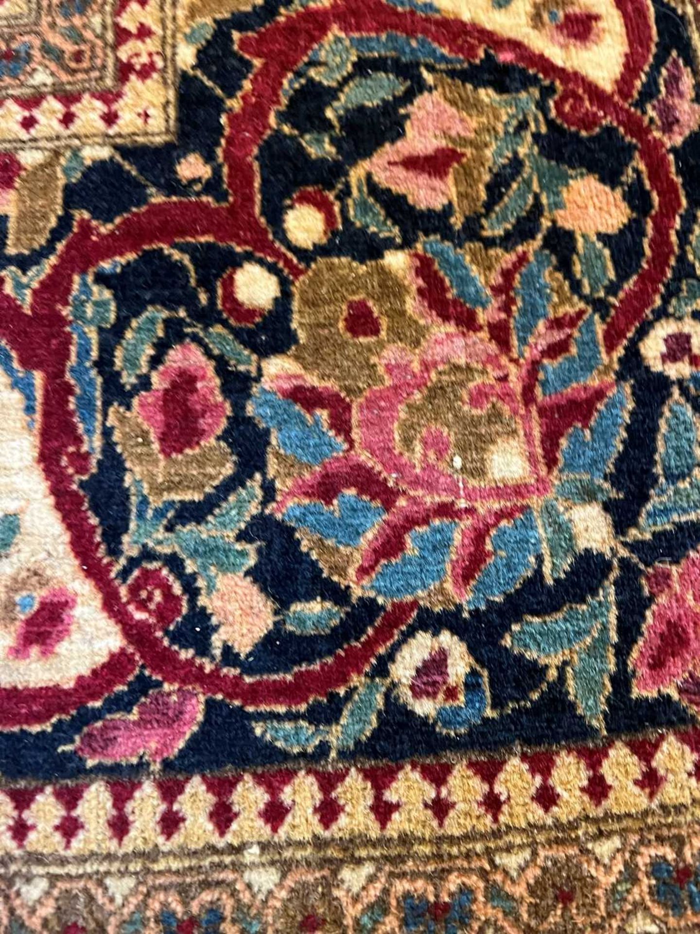 A Persian wool rug - Image 13 of 13