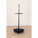 An ebonised cast iron stick stand,