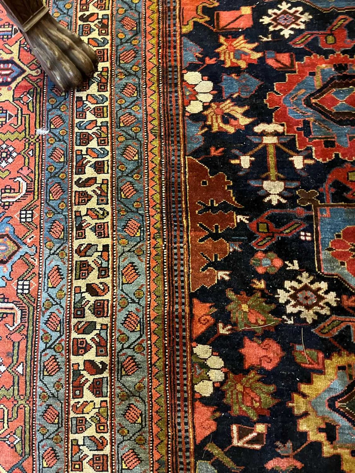 A large Persian wool carpet, - Image 10 of 28