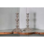 A pair of Queen Anne cast Britannia standard silver candlesticks,