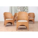 A set of four rattan armchairs,