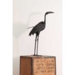 An eastern bronze figure of a crane,