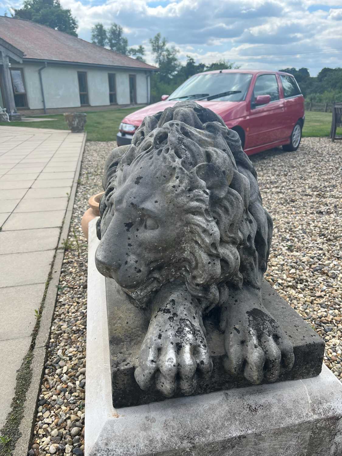 A pair of monumental marble lions on plinths, - Image 25 of 25