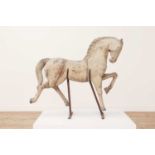 A carved wood carousel galloper,