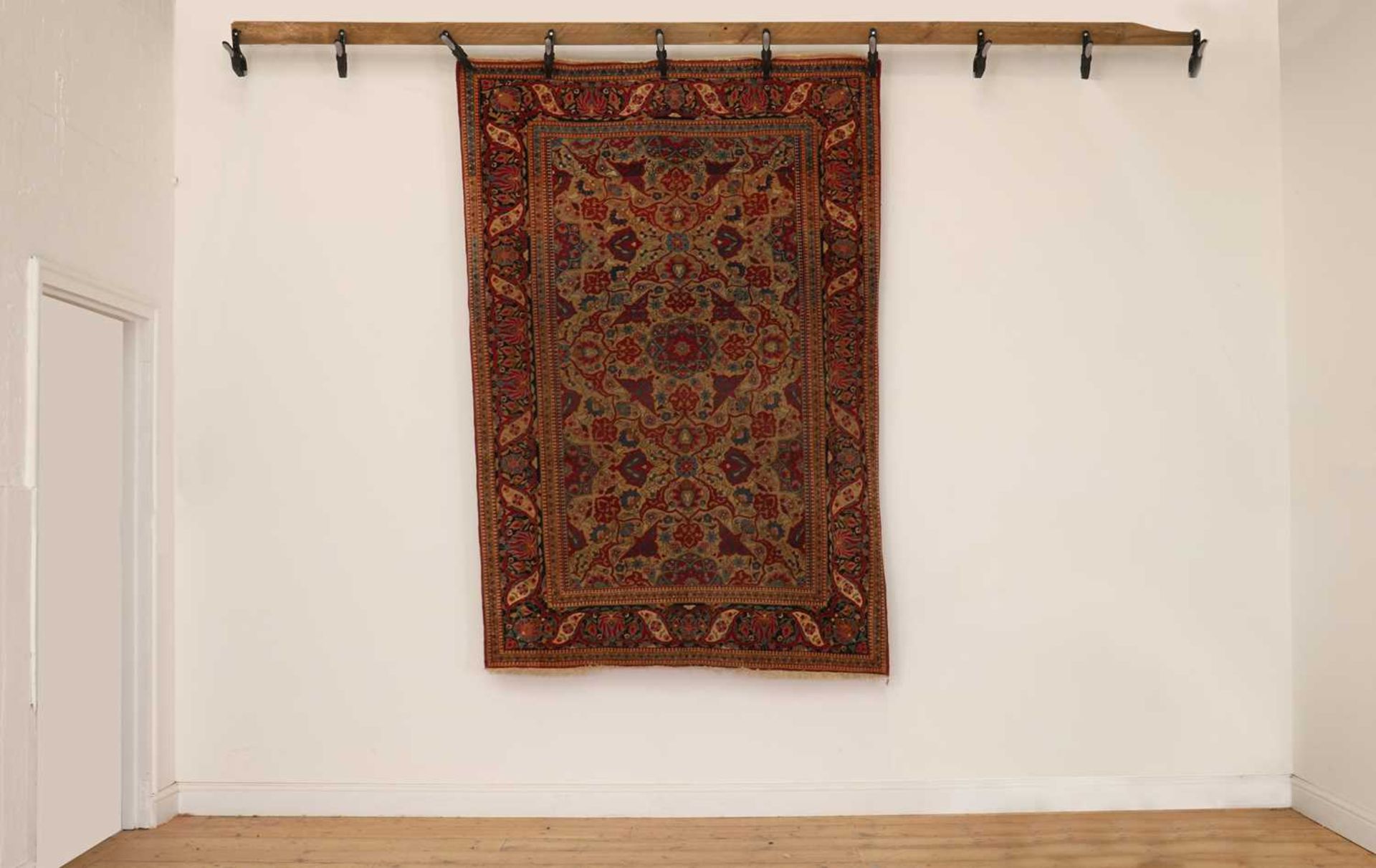 A Persian wool rug