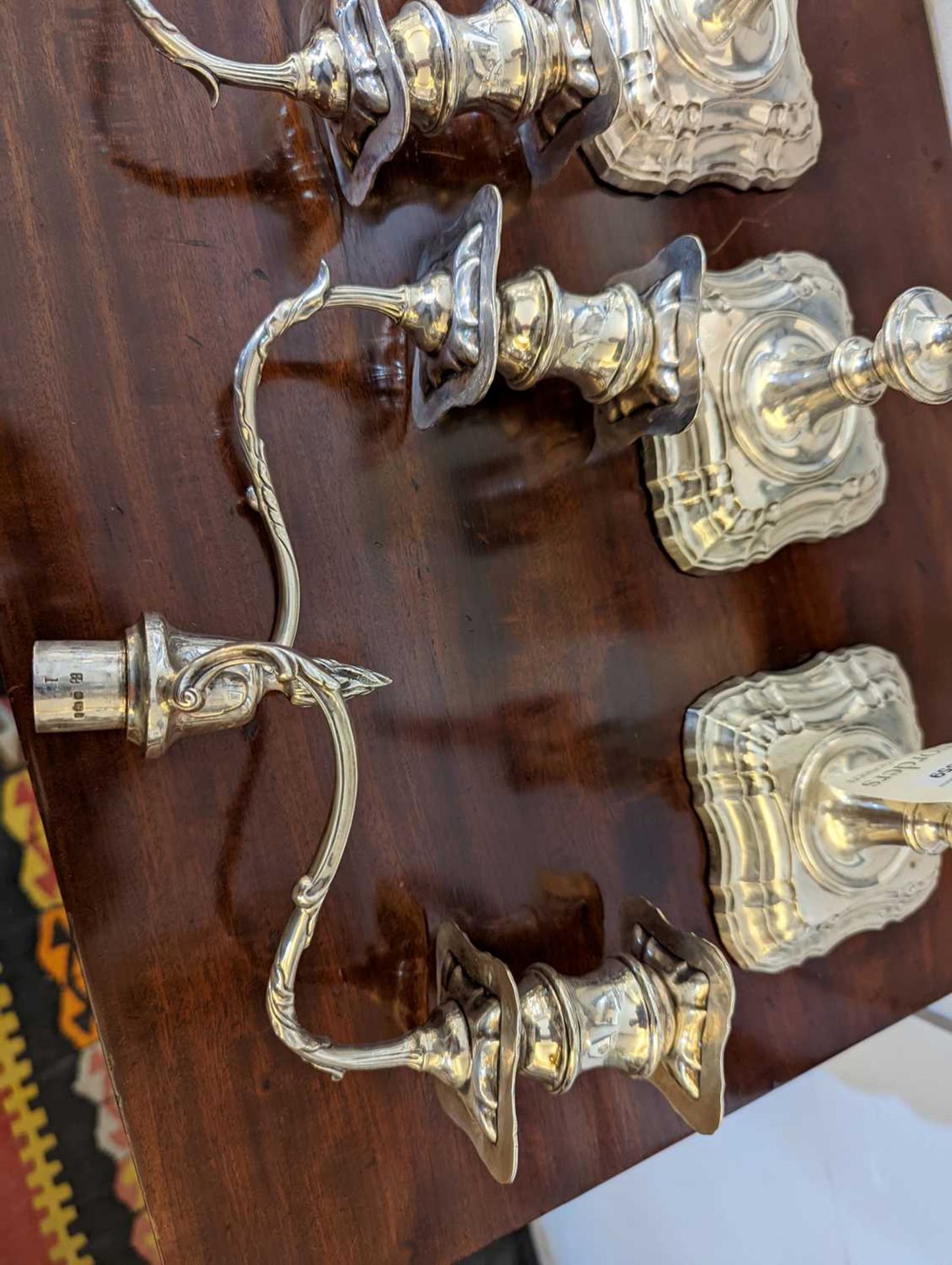 A pair of silver two-light candelabra, - Image 19 of 19