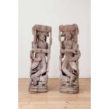 A pair of hardwood figural architectural fragments,