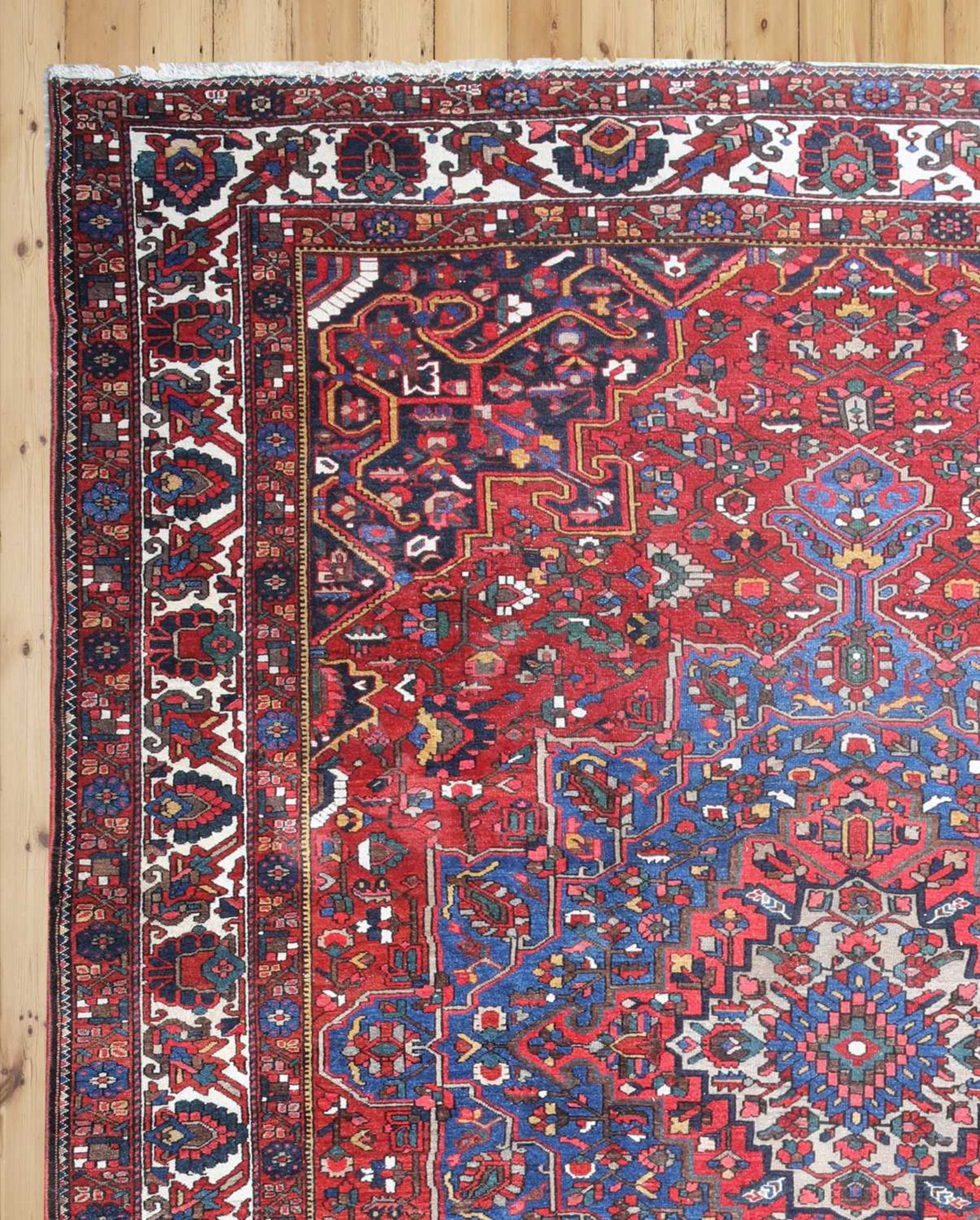 A Persian Heriz wool carpet,