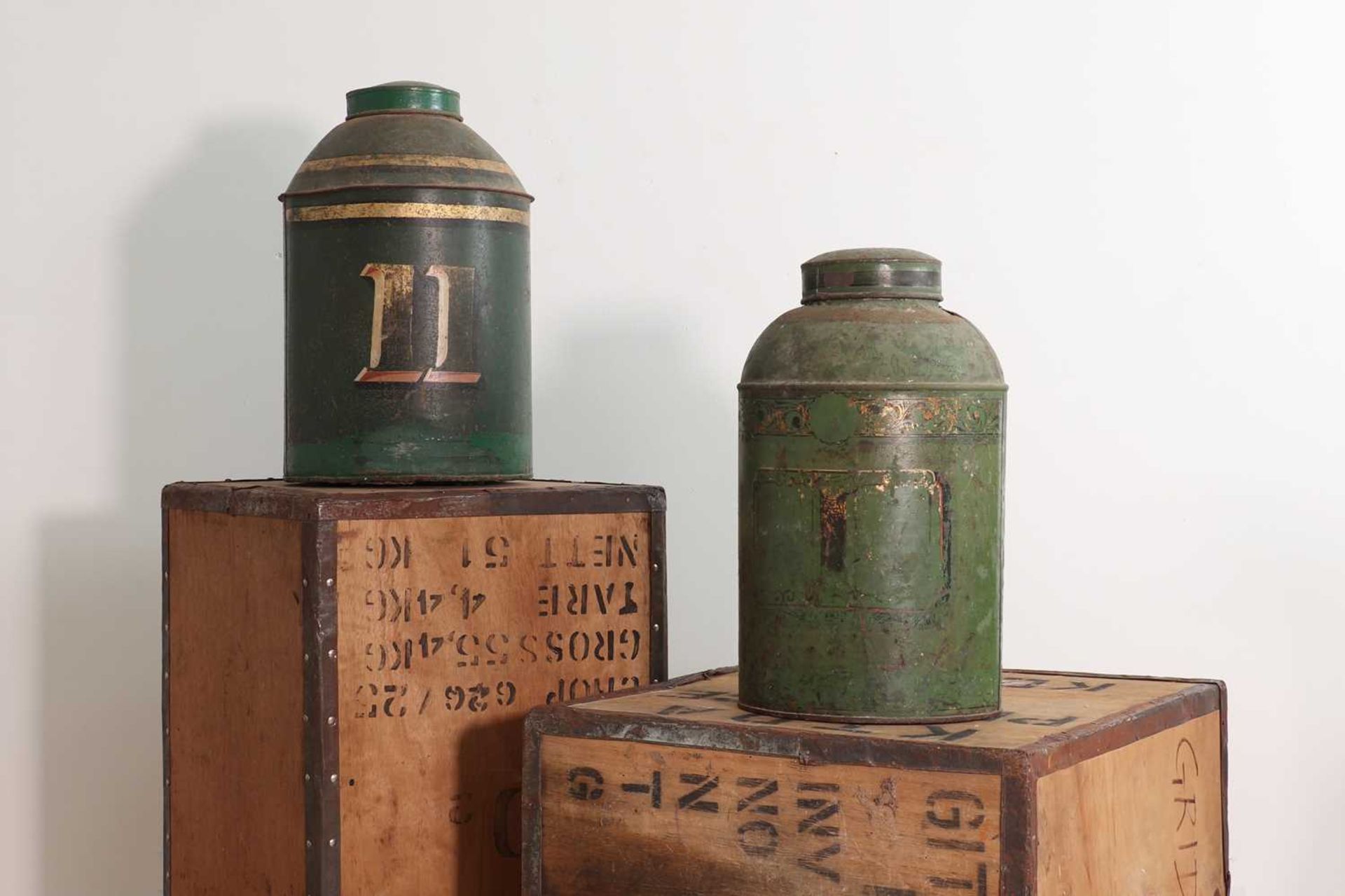 Two Regency green-painted toleware tea canisters,
