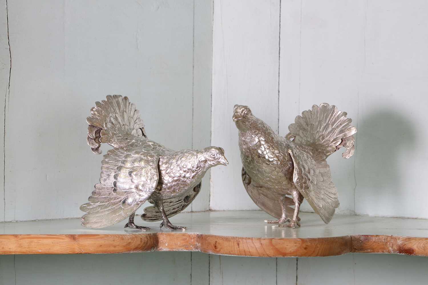 A German metalware brace of game birds,