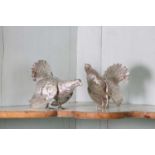 A German metalware brace of game birds,