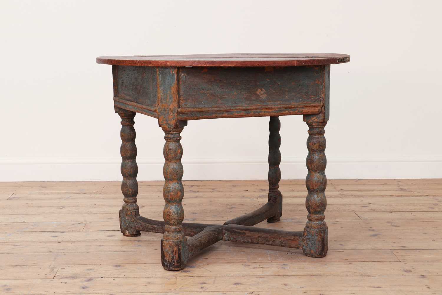 A painted softwood demilune fold-over table,