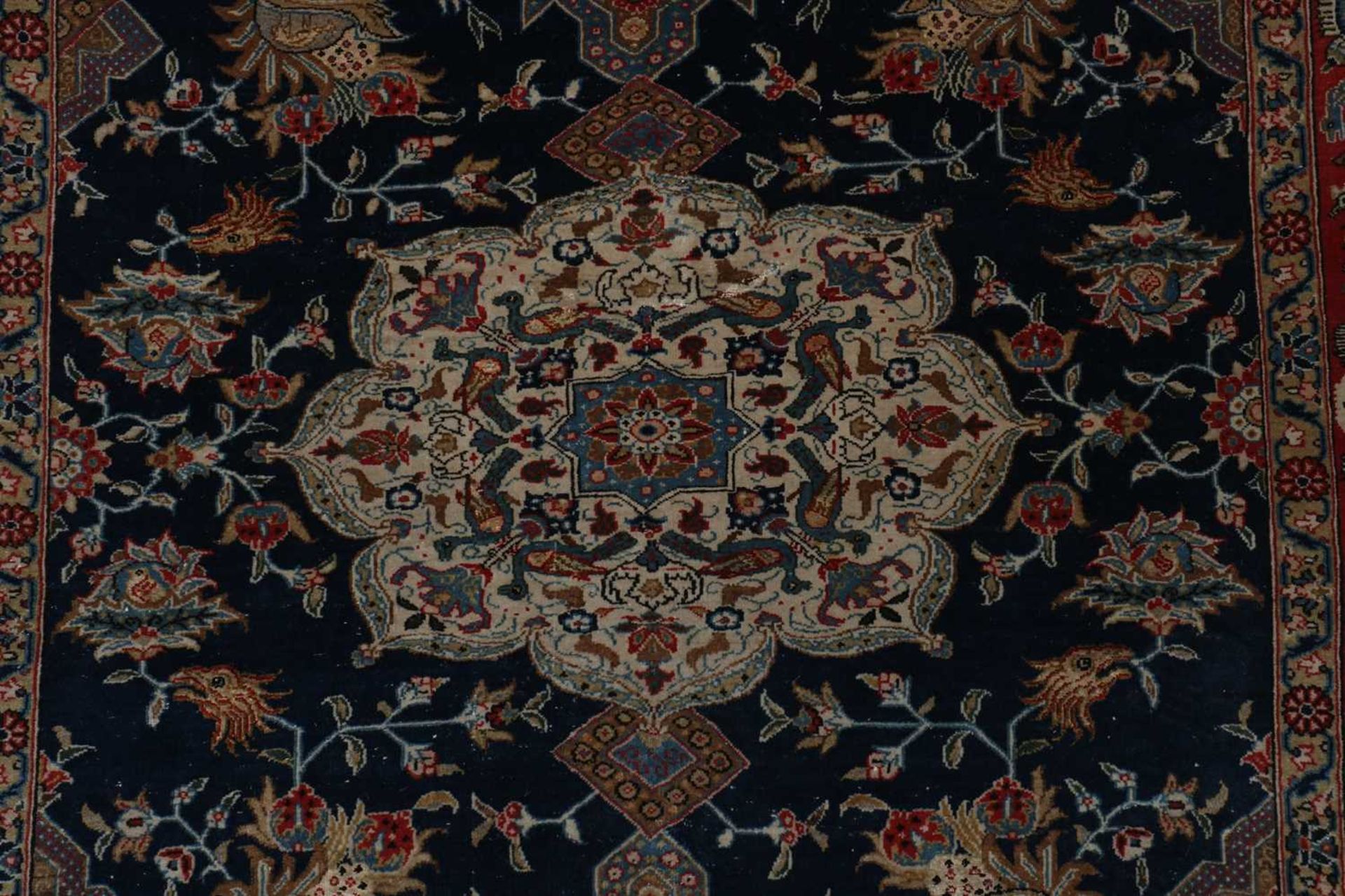 A Persian wool and silk rug, - Image 3 of 5