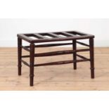 A Victorian Aesthetic period walnut luggage rack,