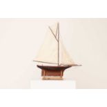 A model sailing pond yacht,