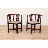 A pair of George III Chippendale period mahogany corner elbow chairs,