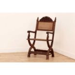 A carved sandalwood elbow chair,