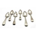 A set of four George III silver Fiddle pattern dessert spoons